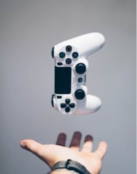 gamepad male hand throwing up white background play control